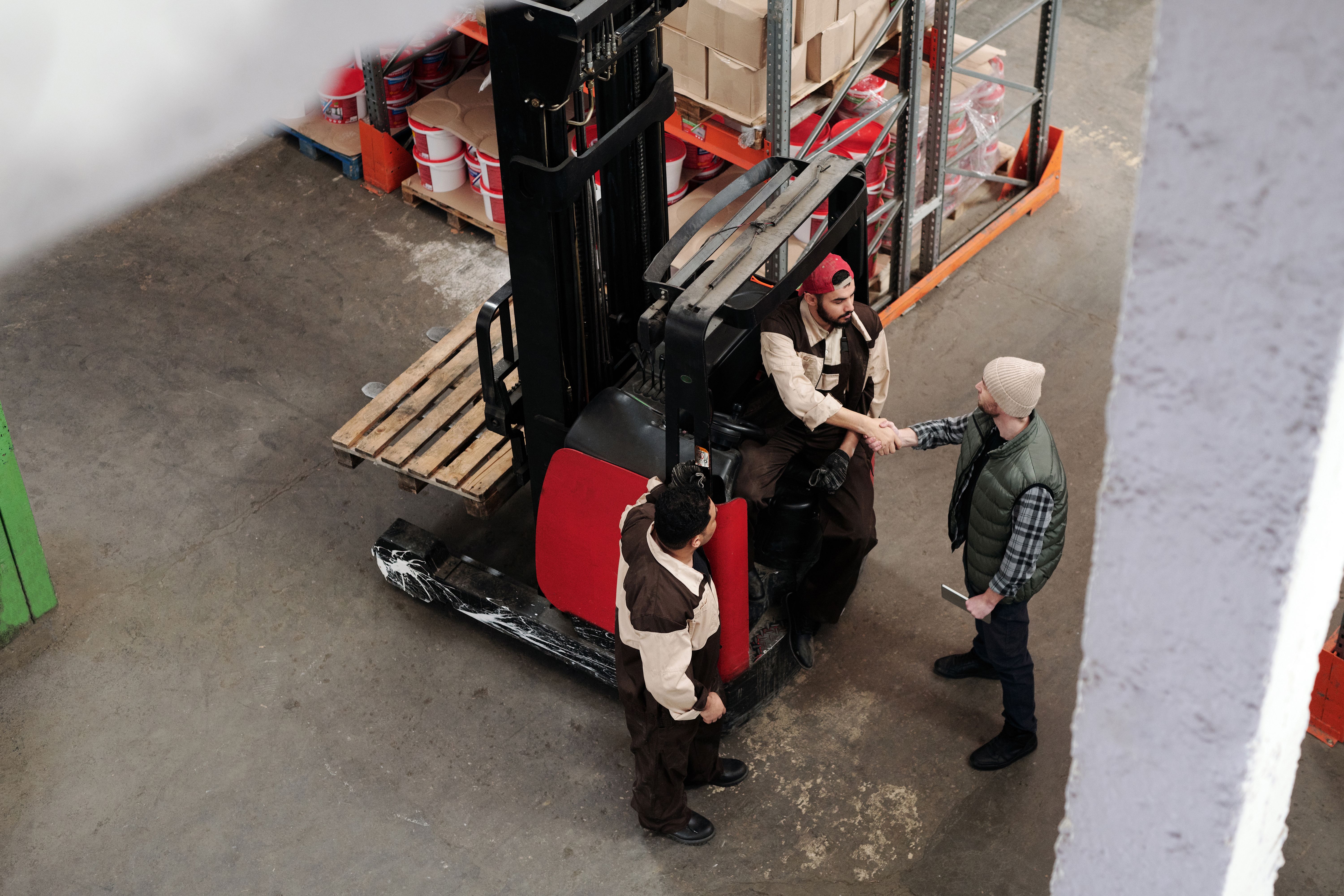 Industrial warehouse team confirming procurement support and cooperation